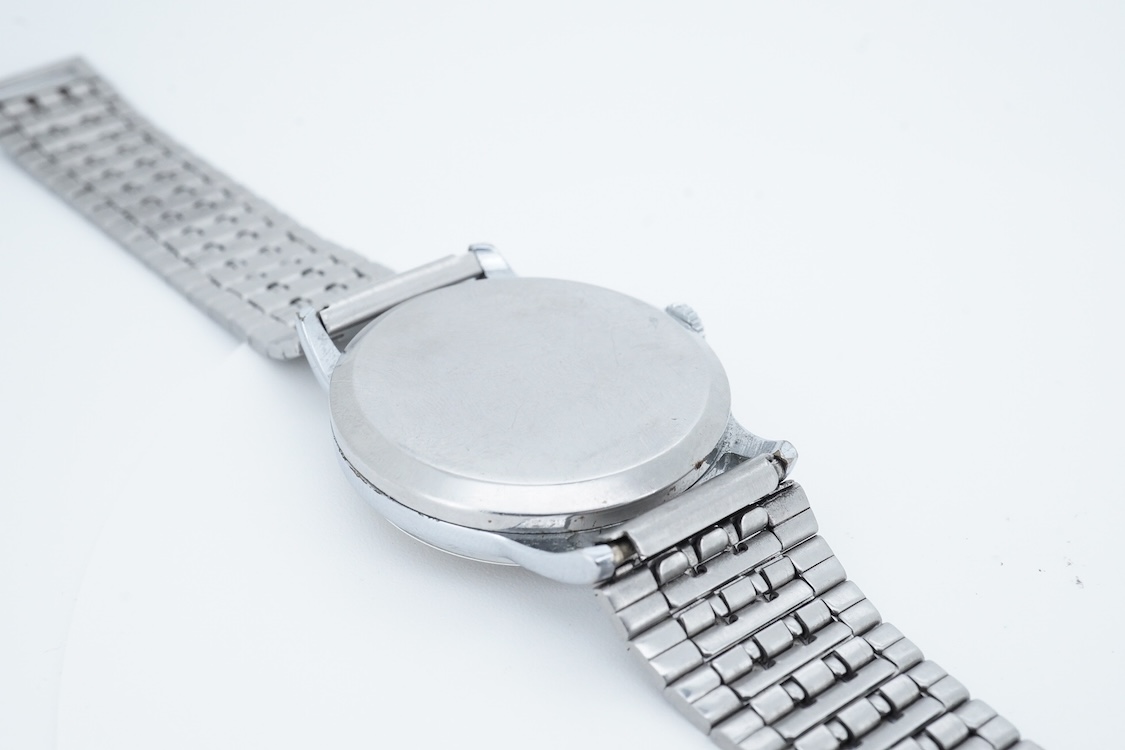 A gentleman's 1950's? steel Tudor manual wind wrist watch, with Arabic dial and subsidiary seconds, ETA movement 1260, case diameter 32mm, on an associated stainless steel strap, no box or papers.